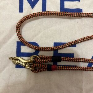 Clare V orange multi sail cord crossbody strap